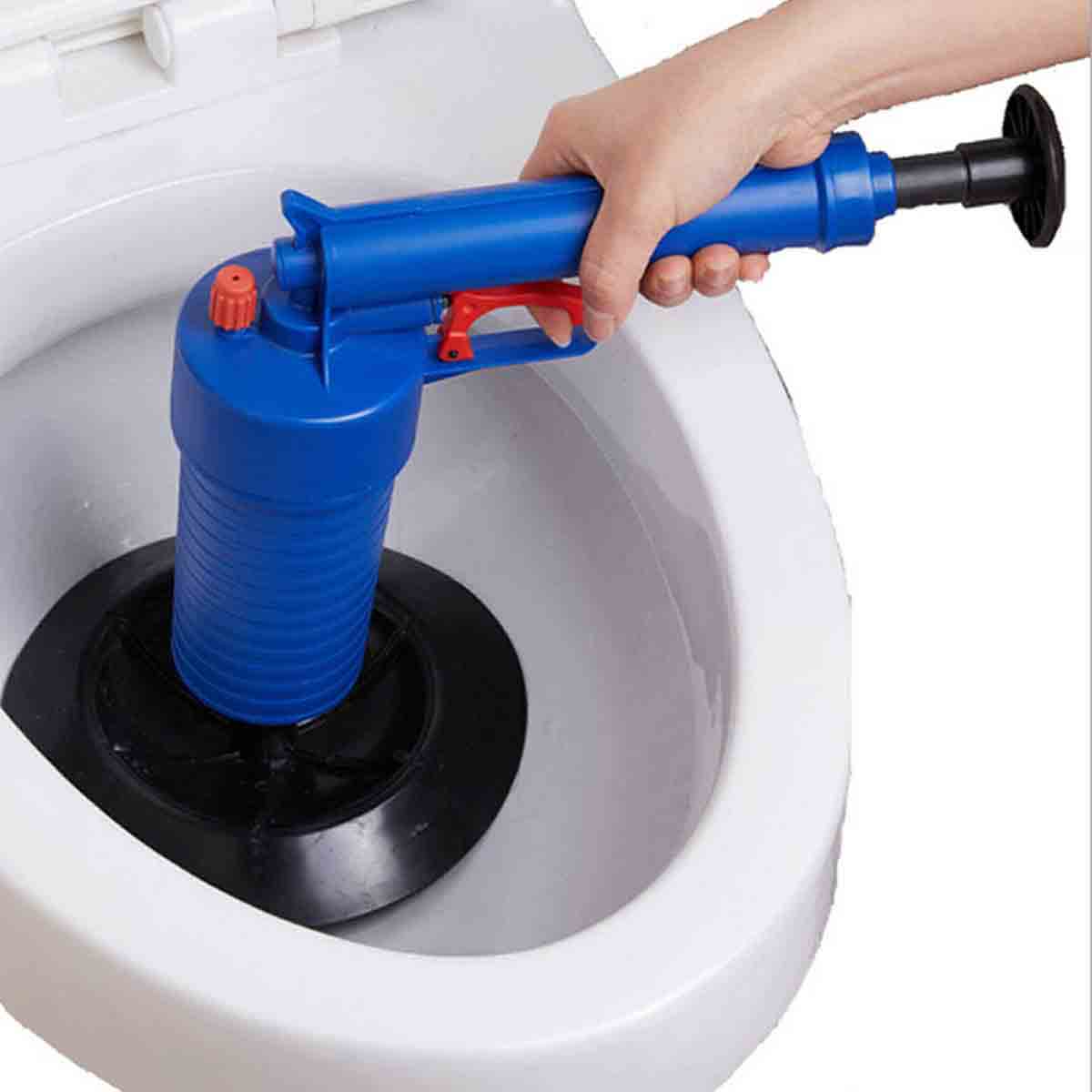 image of Toilet being unblocked using a special Toilet Unblocking tool which is very effective and one we use often